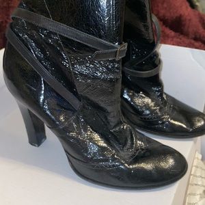 Marc Jacob boots with a buckle that goes around the boot.  Very elegant